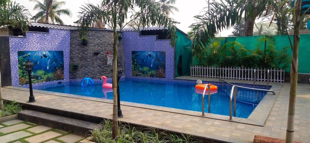 Coastal Bay Inn อลีบาก ภายนอก รูปภาพ