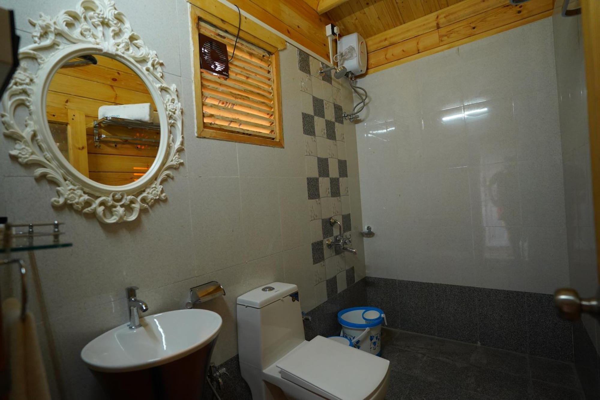 Coastal Bay Inn อลีบาก ภายนอก รูปภาพ