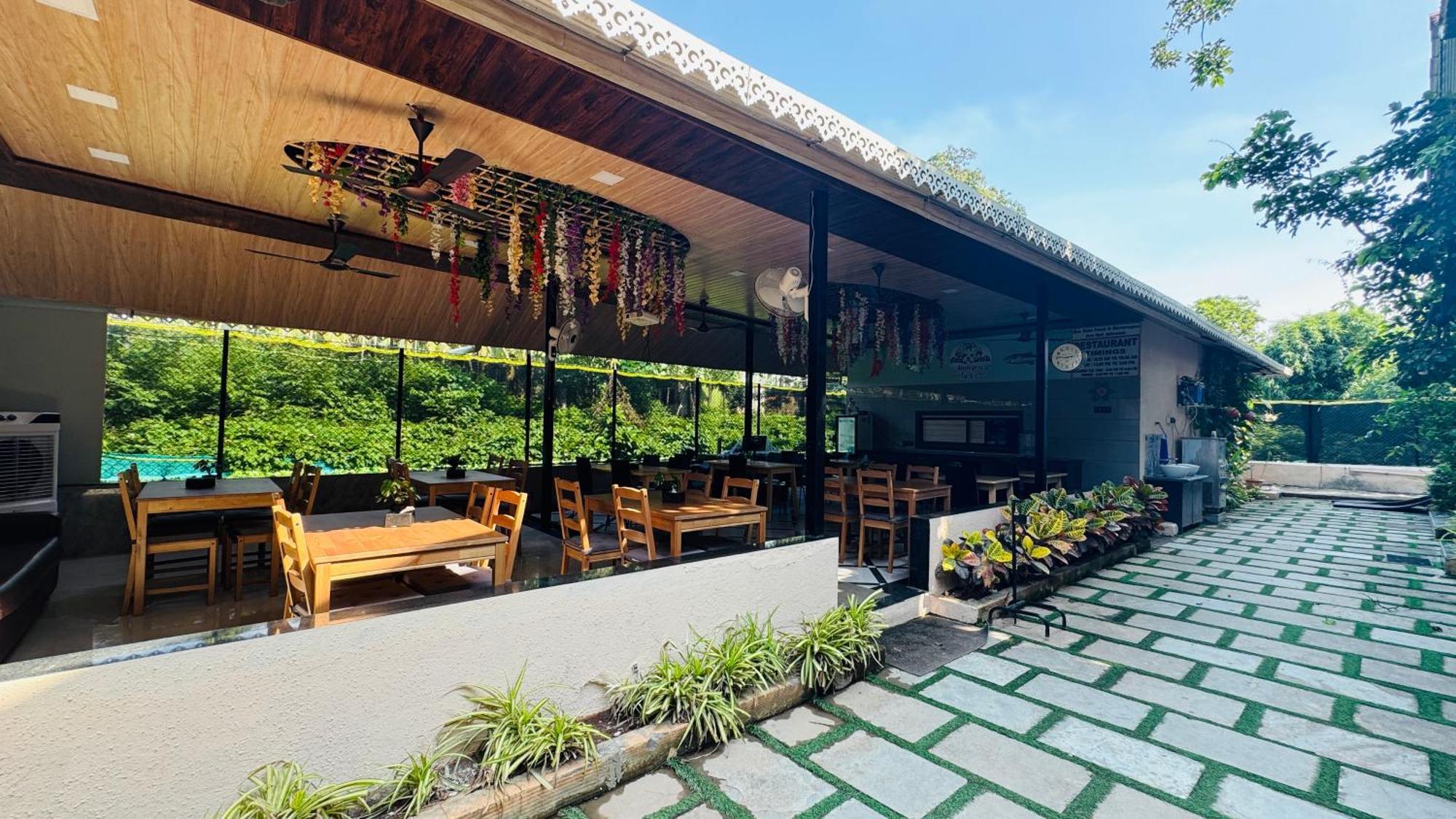 Coastal Bay Inn อลีบาก ภายนอก รูปภาพ